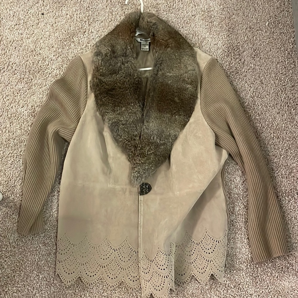 leather jacket with an animal fur collar